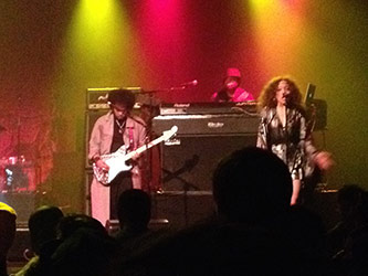 Left to right: Jesse Johnson (guitar), Cleo “Pookie” Sample (keyboards), and Kendra Foster (vocals) performing at the Best Buy Theatre, 11 March 2015. Photo by author.