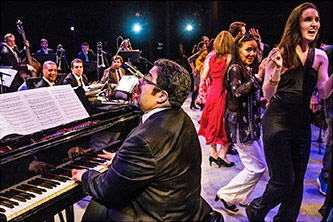 The audience at New York’s Symphony Space joined Arturo O’Farrill and the Afro Latin Jazz Orchestra onstage during the last piece of the “Música Nueva 7” concert on 2 May 2015. Photo by David Garton