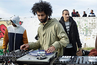 Rami Mhazres (aka DJ Superflava) performs at an outdoor jam that brought together Tunisian and American hip-hop artists through the Next Level cultural diplomacy program. Tunis, Tunisia, 12 February 2017. Photo by the author.