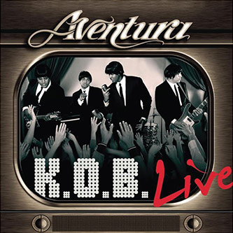Figure 3: CD cover for Aventura’s <em>K.O.B Live</em> (2006). Note the R&B and Beatles influence in Aventura’s members’ fashion style.