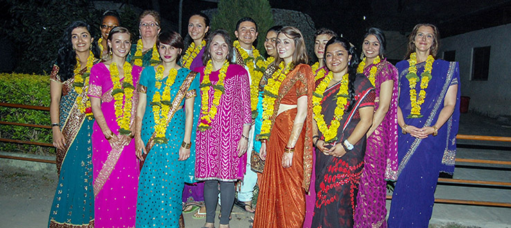 Past programs in India include global health and documentary production.