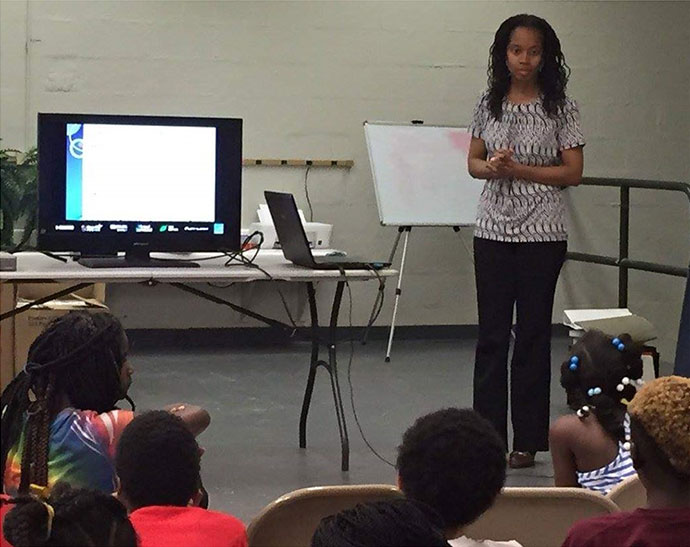 Moody speaking to students at the RIVERS Summer Academy in Georgia about language variation.