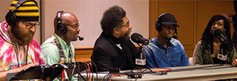 Dr. Cornel West recording the podcast.