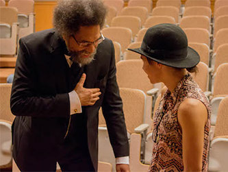 Dr. Cornel West speaking to a Brooklyn College student.