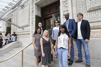The Faculty Select filmmakers stand outside of the Brooklyn Academy of Music (from left to right): Maritza Gomez '14, Acharya Partin '14, Jenny McQualie '14, Lee Jung Woo '14, Lorraine Singletary '14, Rashan Castro '14, and Sean Dwyer '14.
