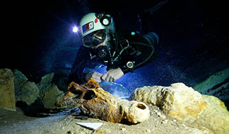 A diver searches for fossils in Madagascar.