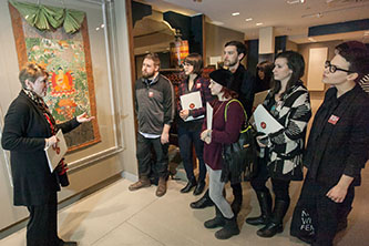 Maria Ann Conelli, dean of the School of Visual, Media and Performing Arts, talks to the museum studies students during a class at the Rubin Museum of Art. 