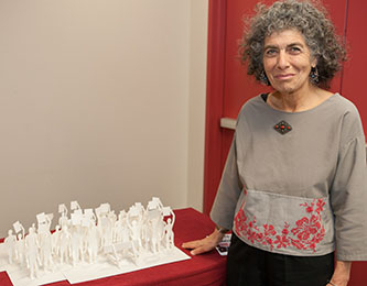 Art student Judith Rubin with her winning entry at the ceremony for the Labor Arts Awards. 