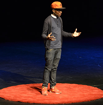 Sean DesVignes recites his poetry at the TEDxCUNY conference. 