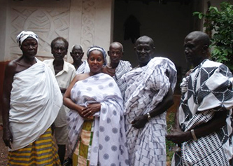 Professor Lynda Day, center, with her Ghanaian hosts