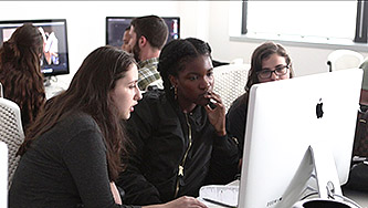 Students (from left to right) Angelica Goldberg, Séun Olukanni, and Sara Schwartz edit their video for the Diversity and Media Access Summer program.
