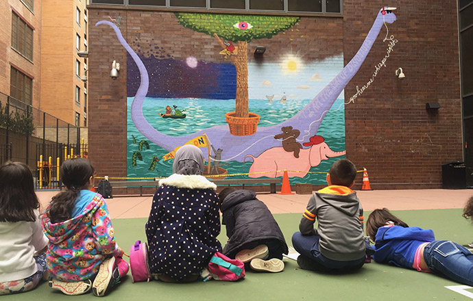 At P.S. 51, students sit and contemplate PUMP's first mural project based on their collaborative poem. Photo by Matthew Burgess.